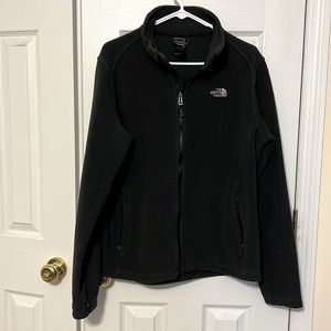Gently used women’s zip up coat by The North Face.
